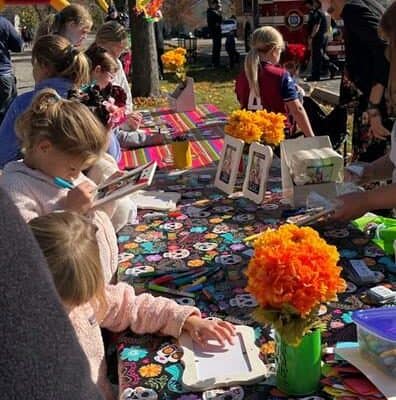 Group of Children Decorate Frames for Ofrenda at Western Springs Park District's Halloween Bash