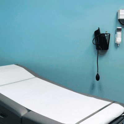 An example of a medical exam room at a community health center offering accessible care through Pillars Community Health and BEDS Plus in the western suburbs.