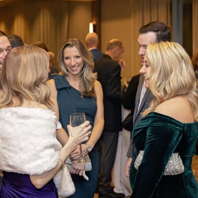 Julie Ryan talks with guests during the reception at the All In for PCH Gala.